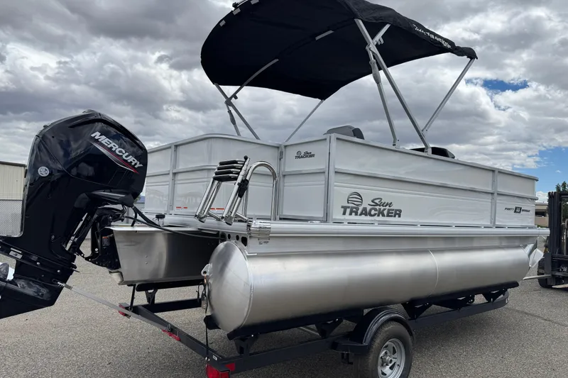 Slide: The Image of 2026 Sun Tracker Party Barge 16 DLX pontoon boat with Mercury outboard motor. - 6