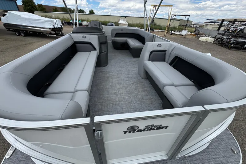 Slide: The Image of 2026 Sun Tracker Party Barge 16 DLX pontoon boat with spacious seating and modern design. - 8