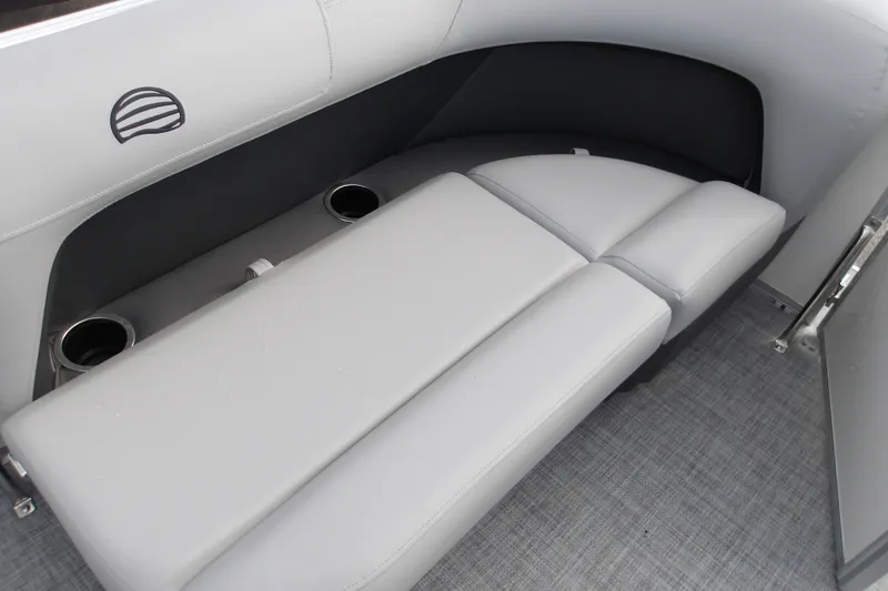 Slide: The Image of 2026 Sun Tracker Party Barge 16 DLX interior seating with cup holders. - 20