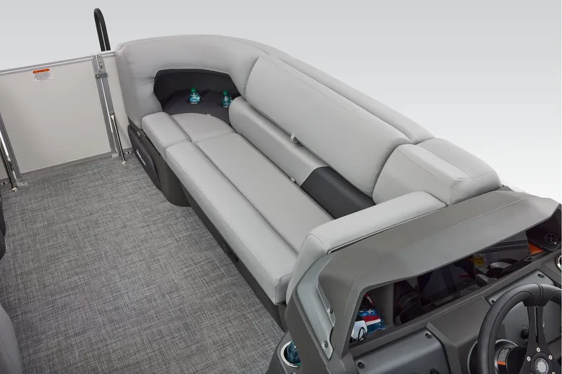 Slide: The Image of 2026 Sun Tracker Party Barge 20 DLX interior storage compartments and seating area. - 20
