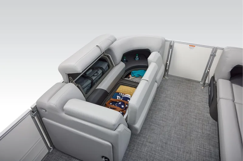 Slide: The Image of 2026 Sun Tracker Party Barge 20 DLX speaker on textured flooring. - 21