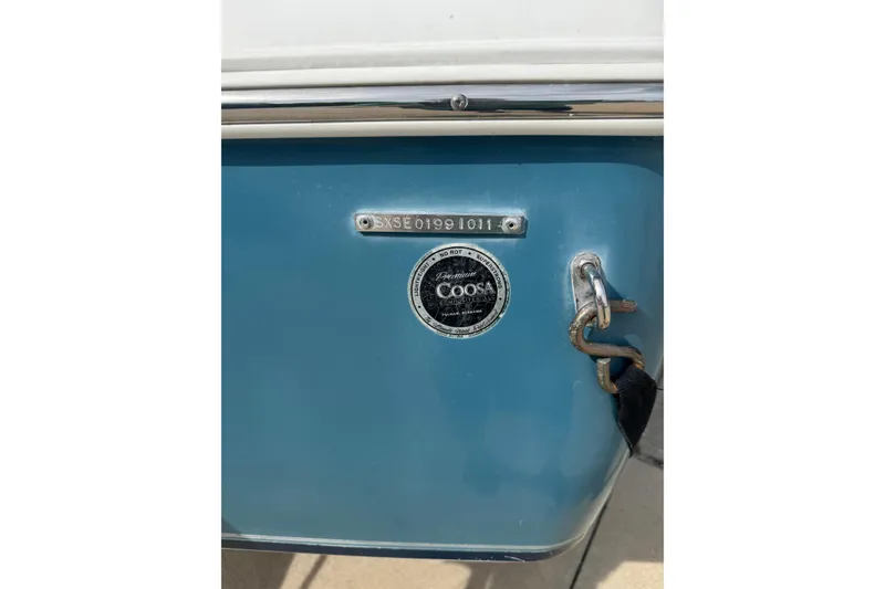 Slide: The Image of 2011 Sea Hunt Triton 177 boat with Coosa composite material label. - 12