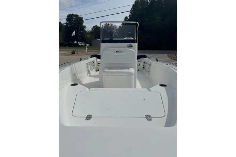 Slide: The Image of 2011 Sea Hunt Triton 177 boat interior with seating and storage compartments. - 6