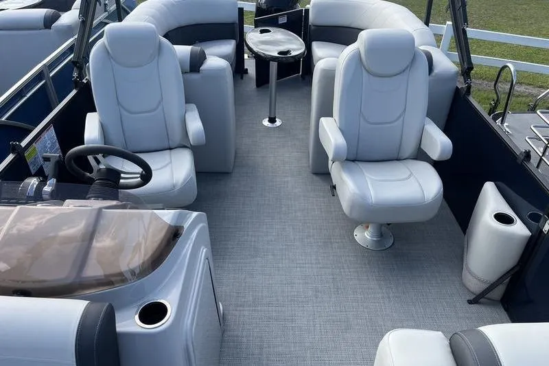 Slide: The Image of 2025 Sylvan Mirage 822 LZ pontoon boat interior with plush seating and modern design. - 12