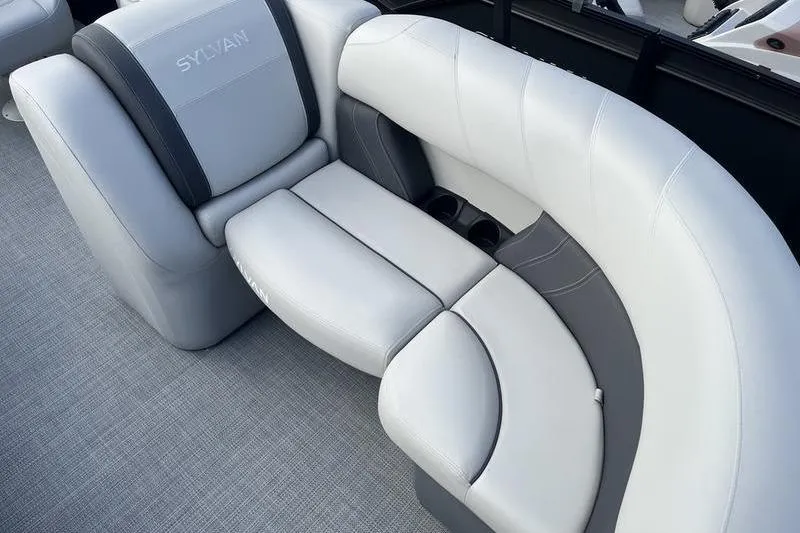 Slide: The Image of Luxurious seating on 2025 Sylvan Mirage 822 LZ pontoon boat, featuring elegant gray upholstery. - 15