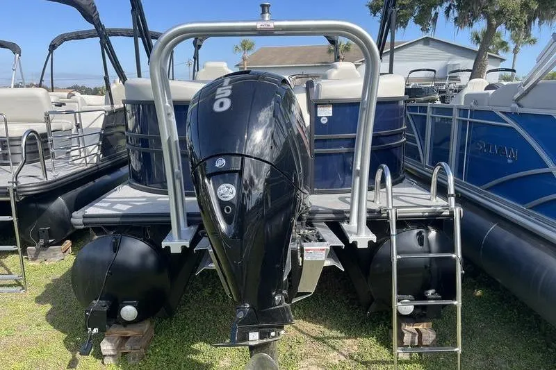 Slide: The Image of 2025 Sylvan Mirage 822 LZ pontoon boat with powerful outboard motor. - 4