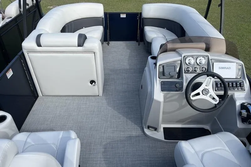 Slide: The Image of Interior of 2025 Sylvan Mirage 822 LZ pontoon boat with modern seating and dashboard. - 7