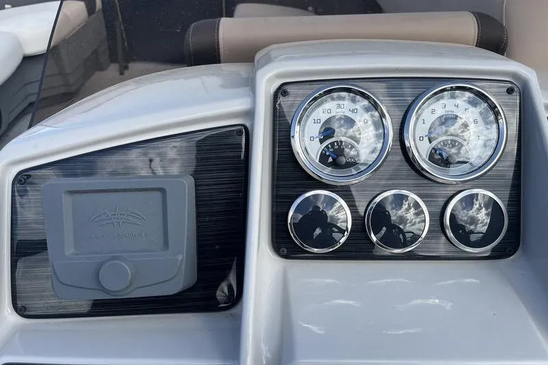 Slide: The Image of Dashboard of 2025 Sylvan Mirage 822 LZ boat with gauges and controls. - 9