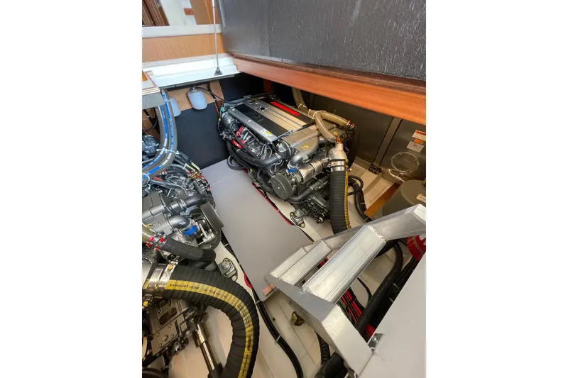 Slide: The Image of Engine room of 2025 Beneteau Swift Trawler 41 Fly, showcasing dual engines and components. - 36