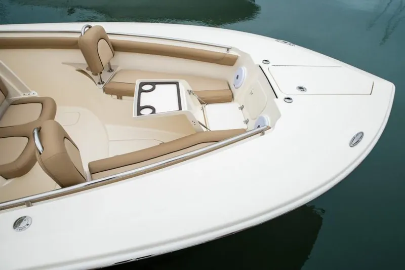 Slide: The Image of 2020 Scout 255 LXF boat interior with seating and storage compartments. - 3