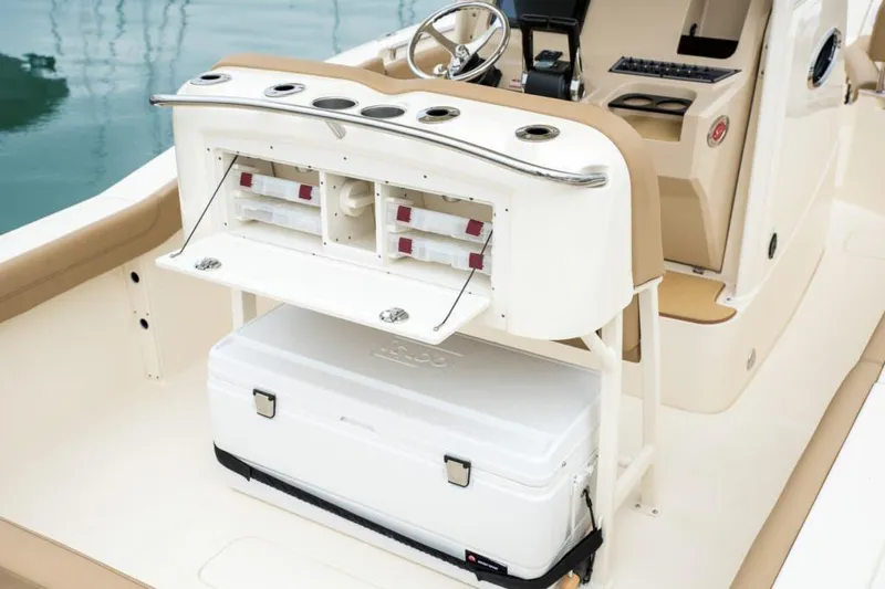 Slide: The Image of 2020 Scout 255 LXF boat seat with gray and white upholstery. - 9