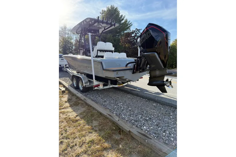 Slide: The Image of 2026 Concept 27' CC boat on trailer with powerful outboard motor. - 3