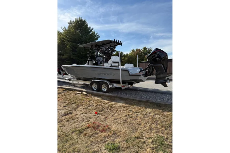 Slide: The Image of 2026 Concept 27' CC boat on trailer, parked outdoors, with powerful outboard motor. - 4