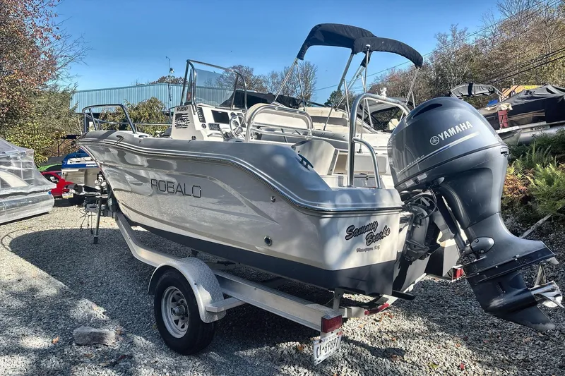 Slide: The Image of 2019 Robalo R180 Center Console boat with Yamaha engine on trailer. - 3