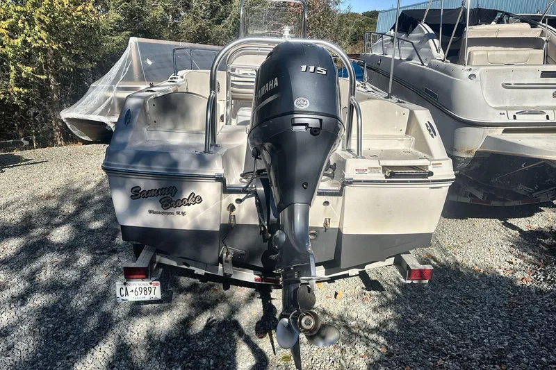 Slide: The Image of 2019 Robalo R180 Center Console boat with Yamaha 115 outboard motor. - 4