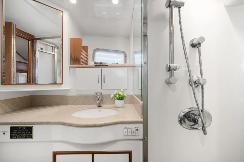 Slide: The Image of Bathroom interior of 2001 Fleming 55 Pilothouse yacht with shower and sink. - 47