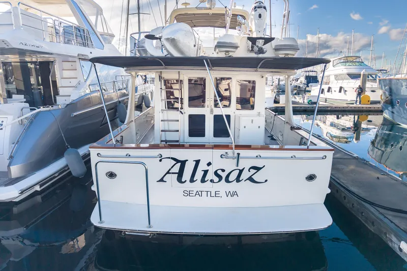 Slide: The Image of Fleming 55 Pilothouse yacht docked, rear view, named "Alisaz," Seattle, WA, 2001 model. - 6