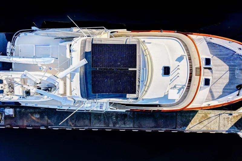 Slide: The Image of Aerial view of 2001 Fleming 55 Pilothouse yacht with solar panels docked. - 72