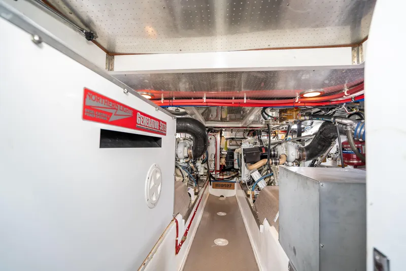 Slide: The Image of Engine room of 2001 Fleming 55 Pilothouse yacht with generator and machinery. - 75