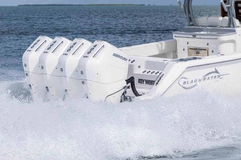 Slide: The Image of 2024 Blackwater 43 Sportfish boat with four powerful Mercury outboard engines on the ocean. - 33