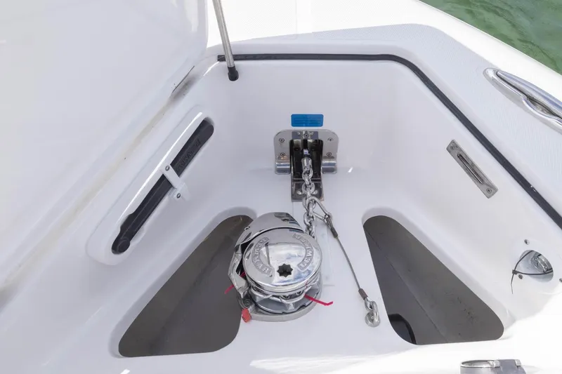 Slide: The Image of Anchor compartment of 2024 Blackwater 43 Sportfish boat with chain and winch. - 36