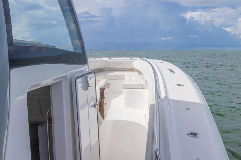 Slide: The Image of 2024 Blackwater 43 Sportfish boat on open water, showcasing sleek design and spacious deck. - 43