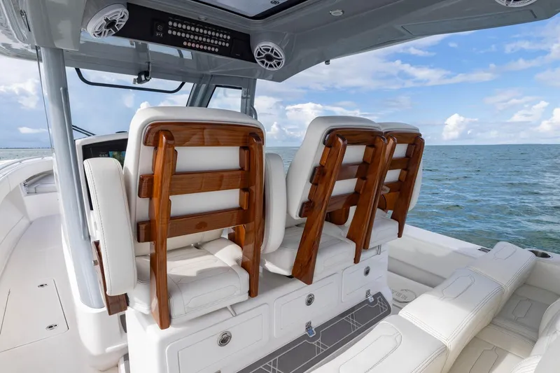 Slide: The Image of 2024 Blackwater 43 Sportfish boat interior with luxurious seating and ocean view. - 49