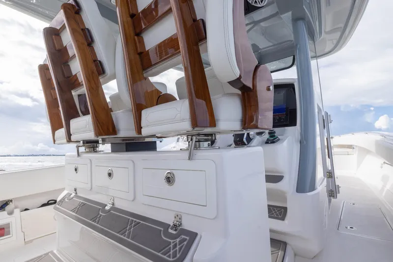 Slide: The Image of 2024 Blackwater 43 Sportfish boat interior with luxurious seating and modern controls. - 53