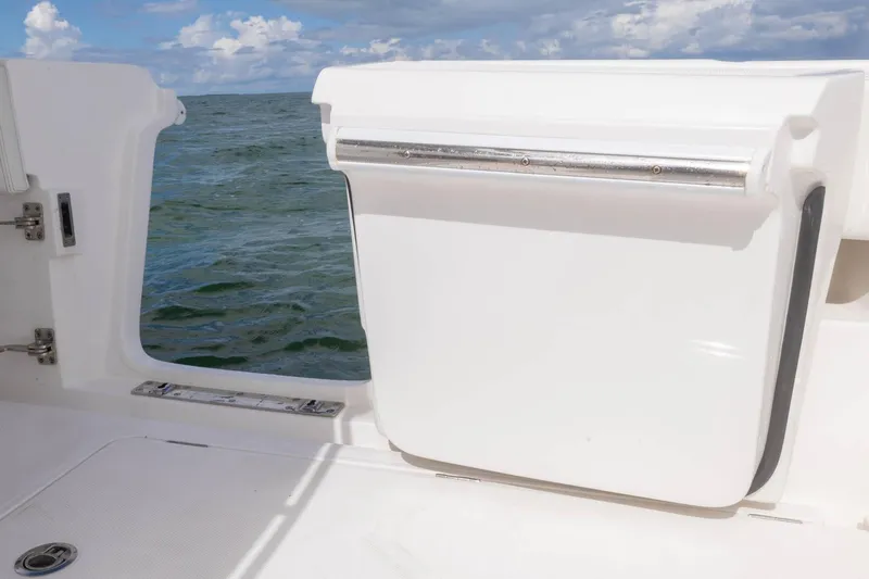 Slide: The Image of 2024 Blackwater 43 Sportfish boat with open side door, ocean view. - 64