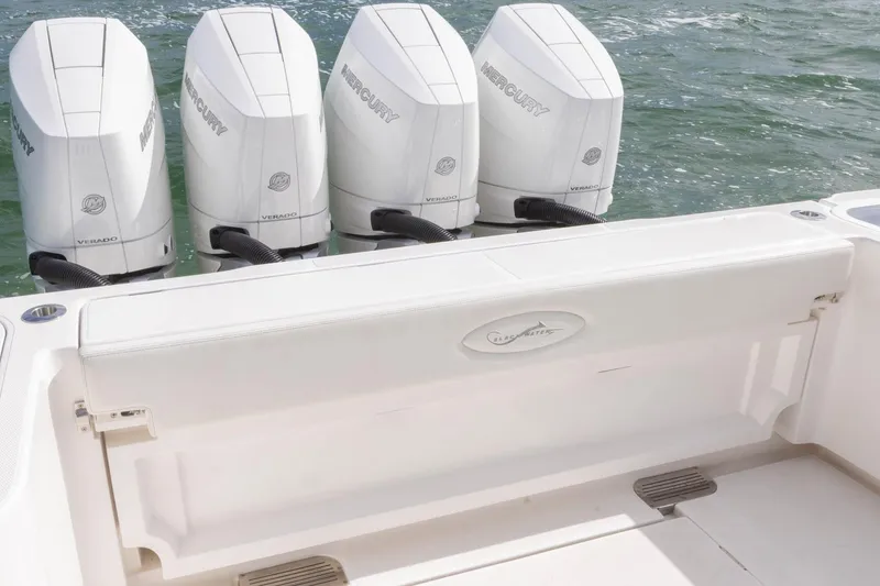 Slide: The Image of 2024 Blackwater 43 Sportfish boat with four Mercury Verado engines on water. - 70