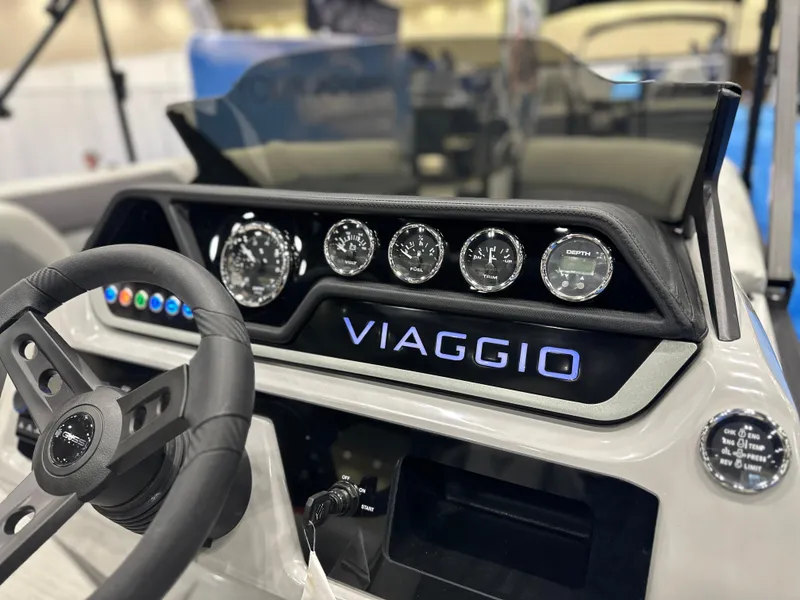 Slide: The Image of Viaggio V22U 2025 dashboard with steering wheel and instrument panel. - 13