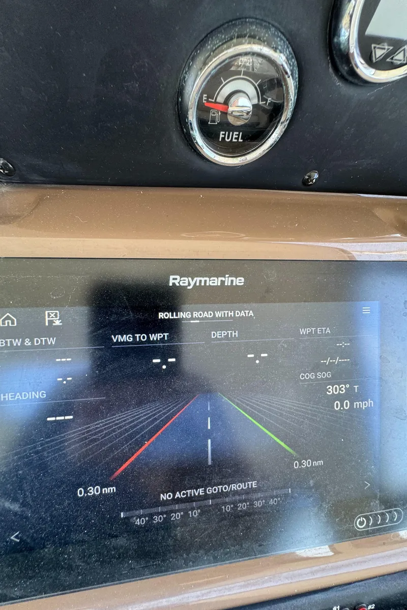 Slide: The Image of Raymarine navigation display on 2018 Crownline 350 SY boat dashboard. - 31