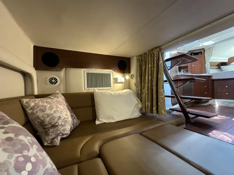 Slide: The Image of Luxurious interior of 2018 Crownline 350 SY yacht with cozy seating and elegant decor. - 42