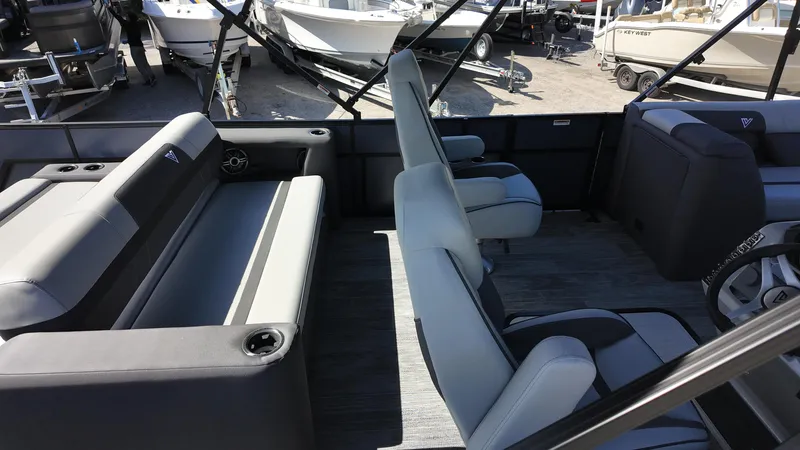 Slide: The Image of 2025 Viaggio X22S boat interior with gray seating and modern design. - 9