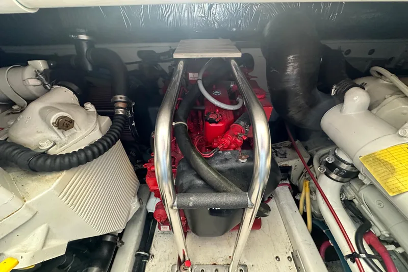 Slide: The Image of Engine compartment of a 2004 Tiara Yachts 3500 Open, showcasing mechanical components. - 35
