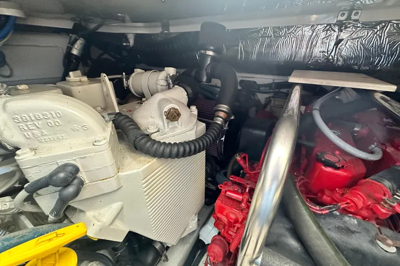 Slide: The Image of Engine compartment of a 2004 Tiara Yachts 3500 Open, showcasing mechanical components. - 37