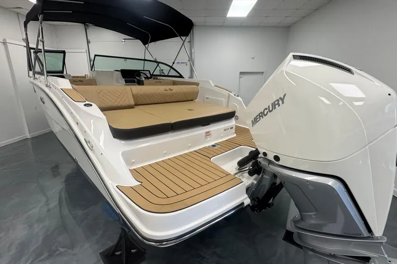 Slide: The Image of 2026 Sea Ray SDX 230 Outboard boat with Mercury engine, featuring spacious seating and sleek design. - 3