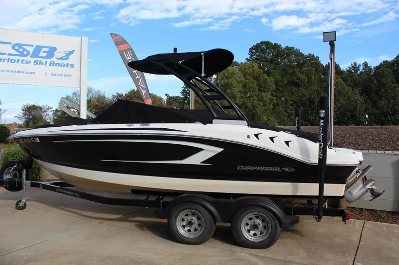 Slide: The Image of 2018 Chaparral 21 H2O Sport boat on trailer at Charlotte Ski Boats dealership. - 2
