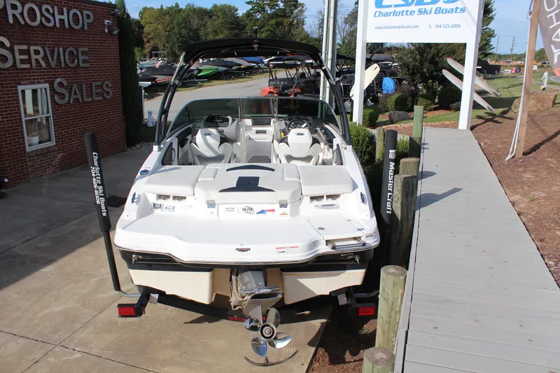 Slide: The Image of 2018 Chaparral 21 H2O Sport boat displayed at Charlotte Ski Boats dealership. - 6