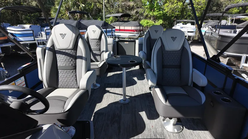 Slide: The Image of 2025 Viaggio Z24Q boat interior with four luxury seats and a central table. - 10