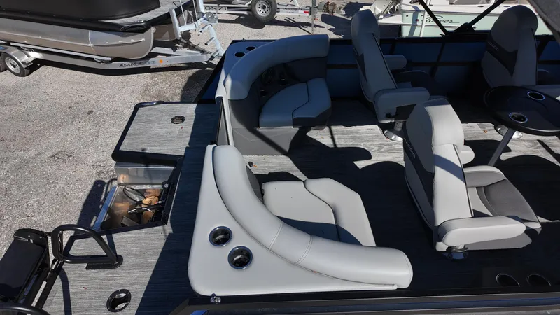 Slide: The Image of 2025 Viaggio Z24Q boat interior with gray seating and modern design. - 7