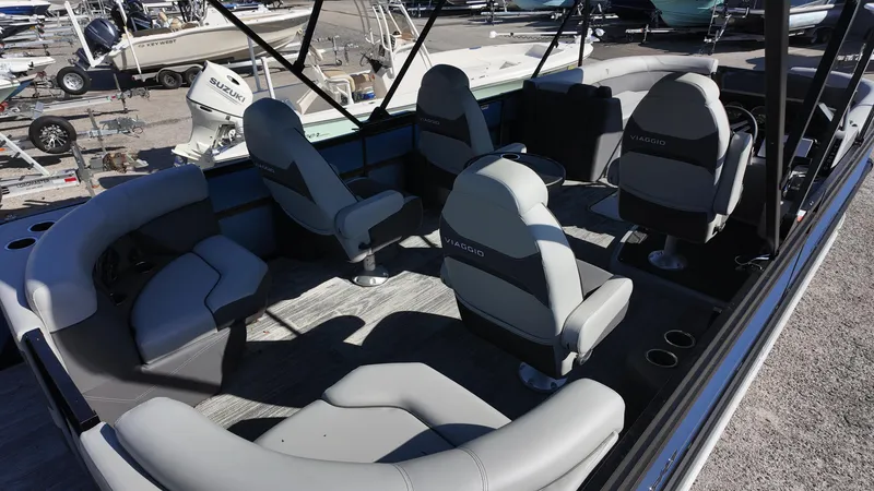 Slide: The Image of 2025 Viaggio Z24Q boat interior with gray seating and modern design. - 8