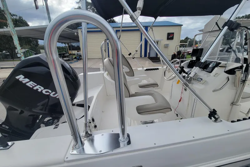 Slide: The Image of 2012 Campion Explorer 492 Center Console with Mercury engine, featuring dual seats and control panel. - 19