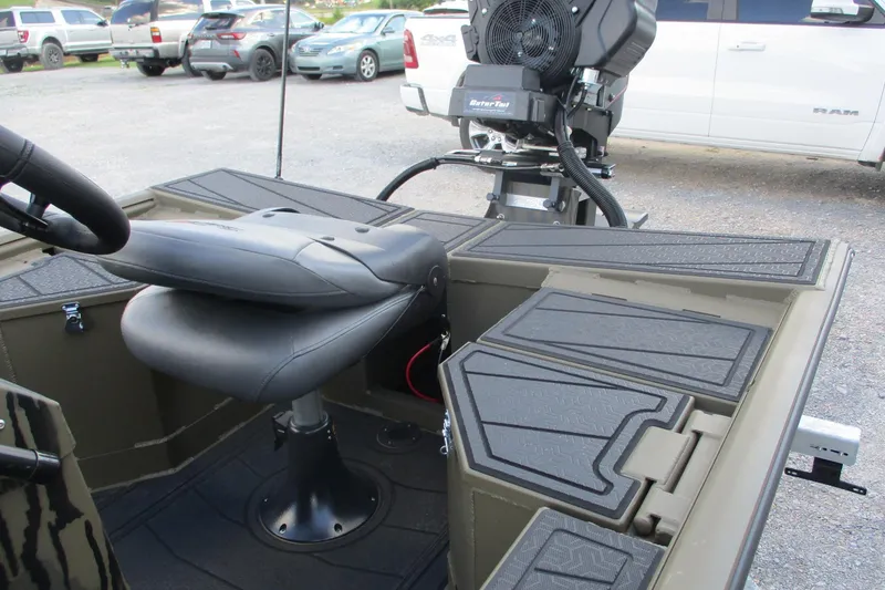 Slide: The Image of 2026 Gator Tail 1854 Extreme CC boat interior with seating and motor detail. - 7