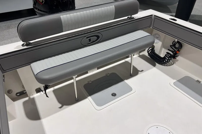 Slide: The Image of Interior of 2026 Defiance Admiral 220 EX boat with two cushioned seats. - 9
