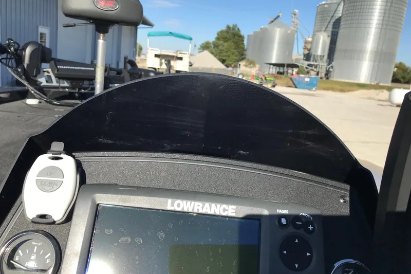 Slide: The Image of 2016 Ranger RT188 boat dashboard with Lowrance display and control panel. - 13