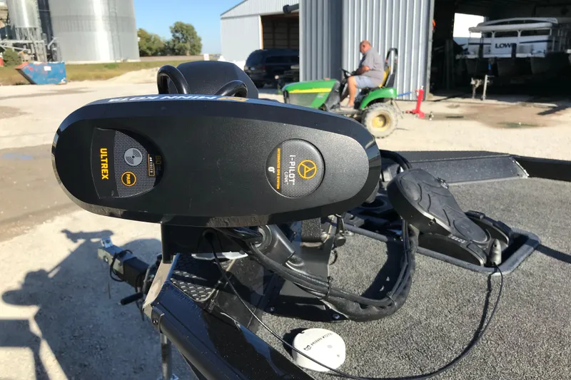 Slide: The Image of 2016 Ranger RT188 with Minn Kota Ultrex trolling motor in a rural setting. - 9