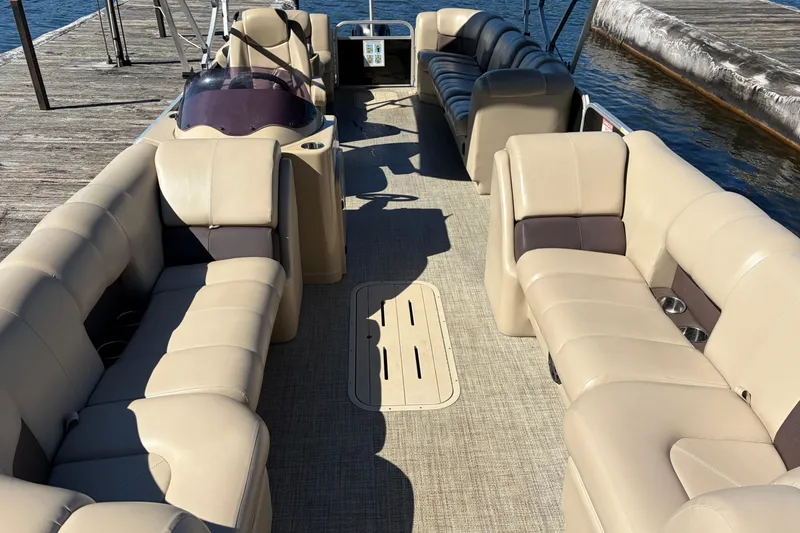 Slide: The Image of 2021 G3 SunCatcher Fusion 325RCX pontoon boat with beige seating and spacious layout. - 5