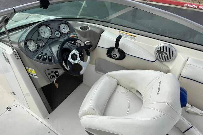 Slide: The Image of Engine compartment of 2006 Rinker 226 Captiva Bowrider with Interstate batteries and wiring. - 18