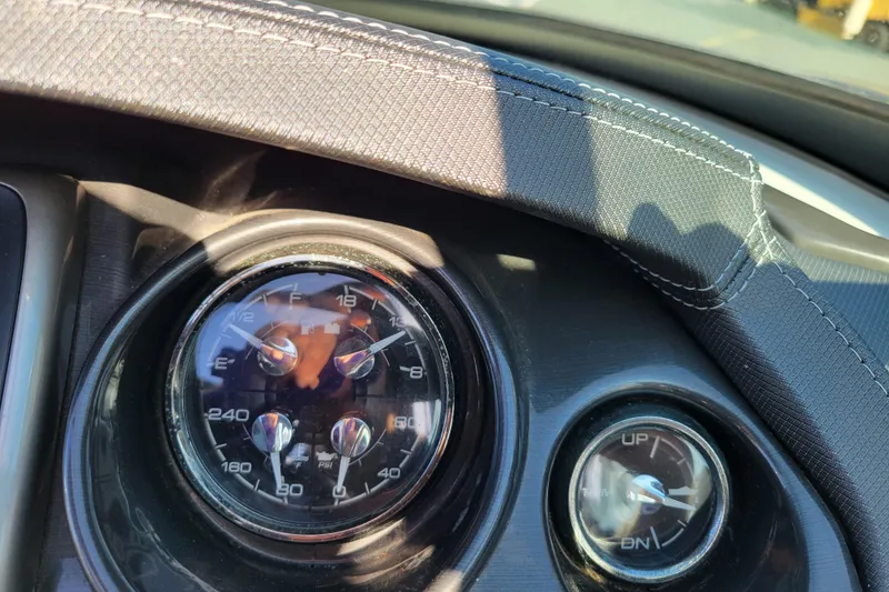 Slide: The Image of Dashboard gauges of a 2018 Monterey 278SS Super Sport boat in sunlight. - 15